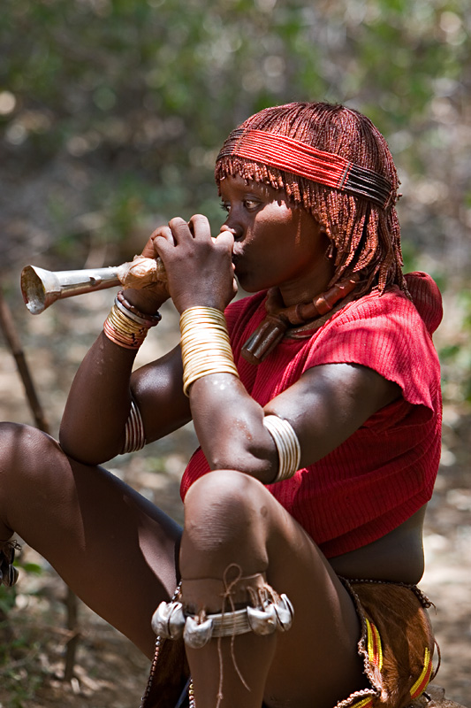 137   Hamar woman performing in bull jump ceremony